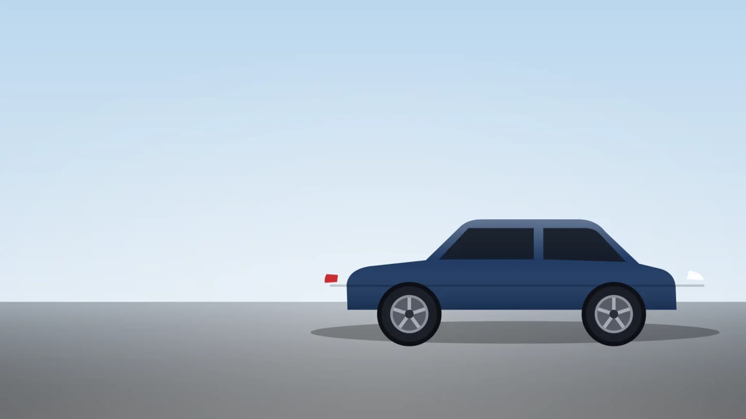 Hatchback on an open highway at sunrise