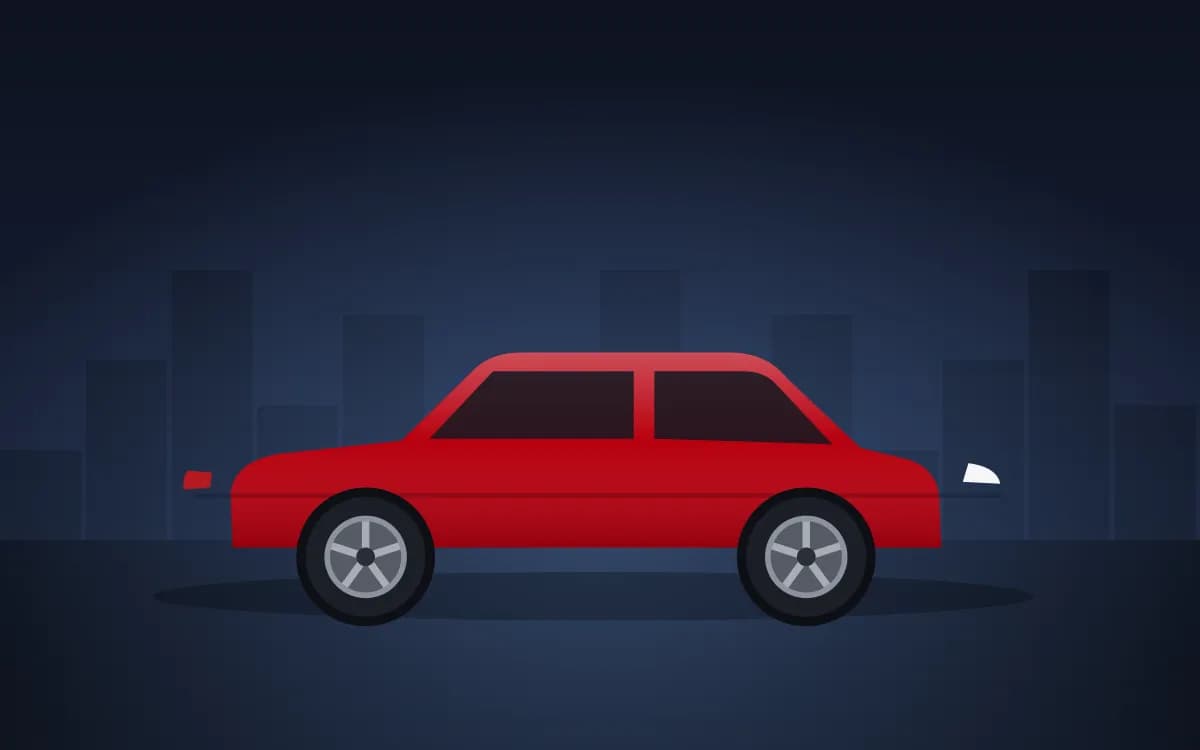 Checking a car tyre's pressure with a gauge